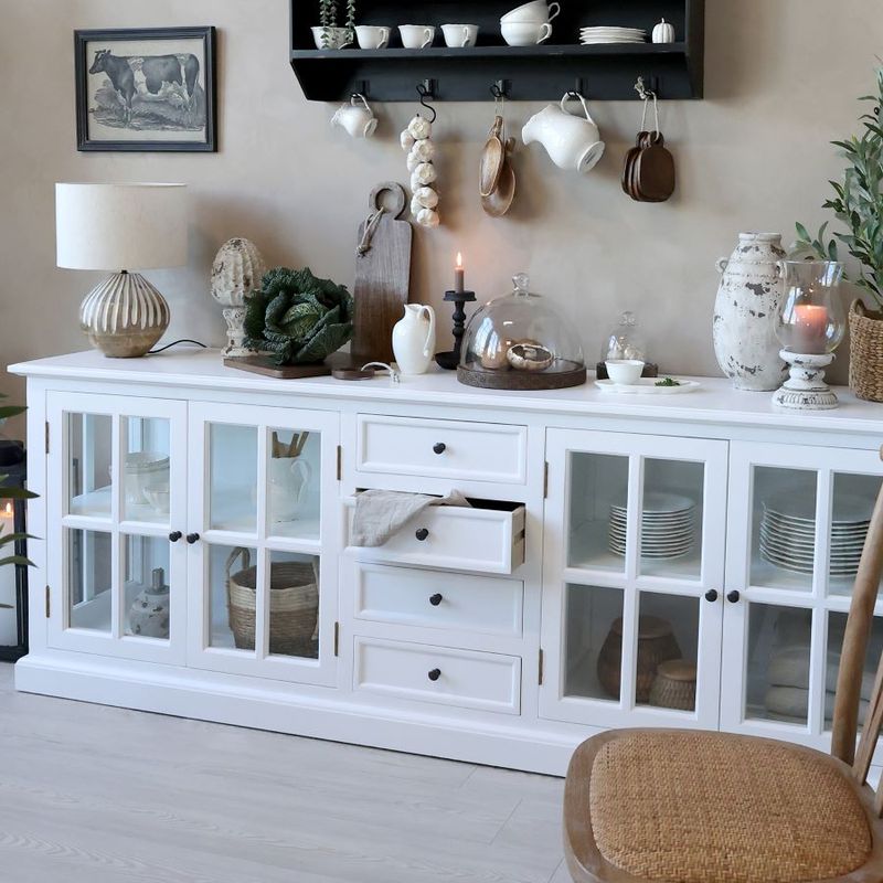 A wonderful quality furniture piece in white.