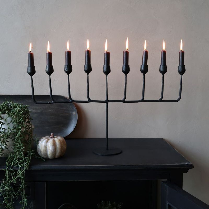 Cathedral Candelabra
Iron finish.
holds nine candles - horizontal design
Lit candles