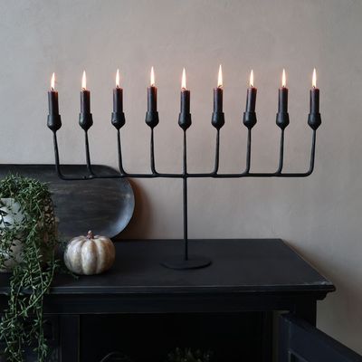 Cathedral Candelabra
Iron finish.
holds nine candles - horizontal design
Lit candles