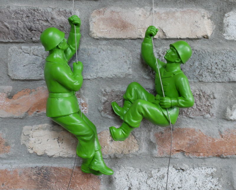 Here they are climbing up a brick wall.