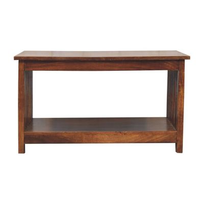 A handsome coffee table of Mango Wood in a warm chestnut finish, with a lower shelf for magazines and so on.