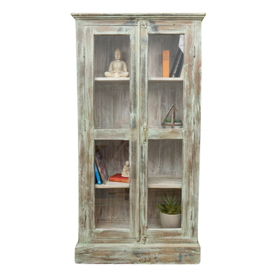 The Jay Display Cabinet has been made from Mango wood and finished in a distressed style. It is over five feet in height and has glazed front cupboard doors.