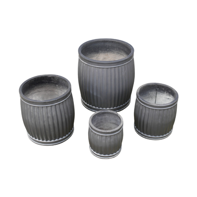 A set of four Feldspar Clay barrel-shaped planters