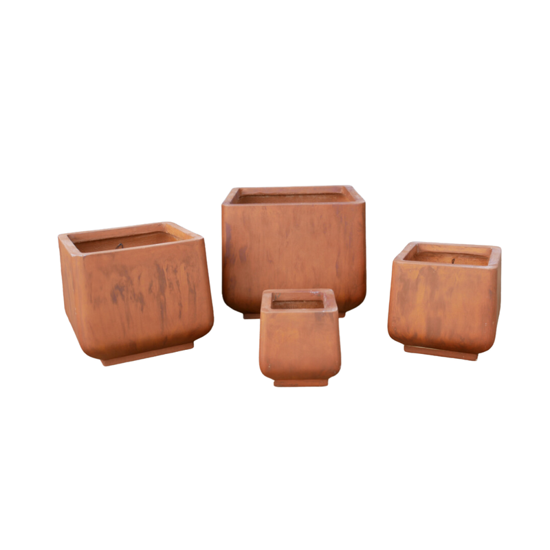 A set of four feldspar clay planters.