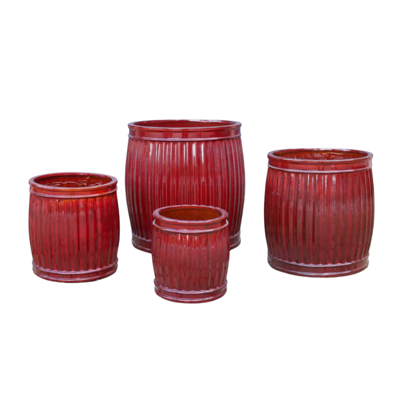 These pleasing Burton planters have a shape slightly reminiscent of old fashioned beer barrels 