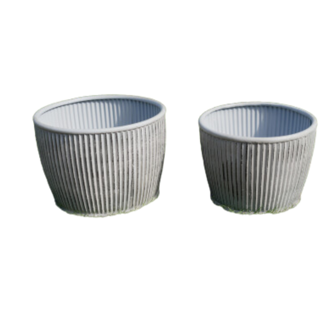 A set of two metal Strata Planter Tubs , of two slightly differing sizes, that look at their best when placed together