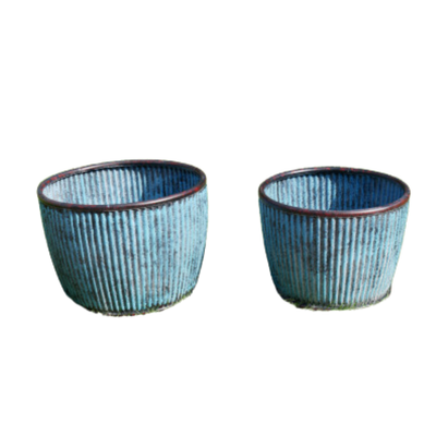 This is a set of Blue Strata planter tubs of outstanding quality, both large, but of differing sizes. You get two tubs in the set.