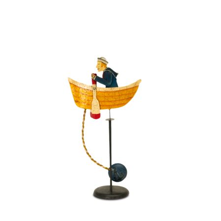 A replica of that old balance toy that still gets the kids excited, but just makes a fine and interesting ornament.