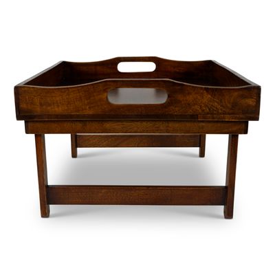 Has its own tray with drop-down legs, so can be used as a bed tray, or a tv tray too. 