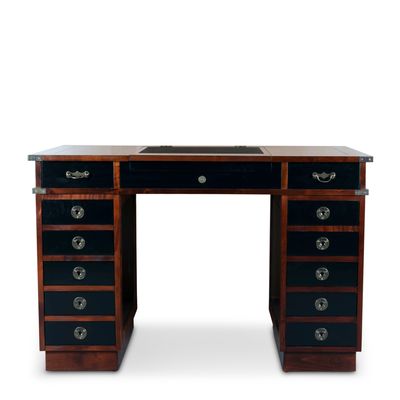 Well, there's desks of all qualities, but nothing quite compares to the Madras. The central desk top opens up to expose a storage space for larger documents or perhaps maps or drawings.