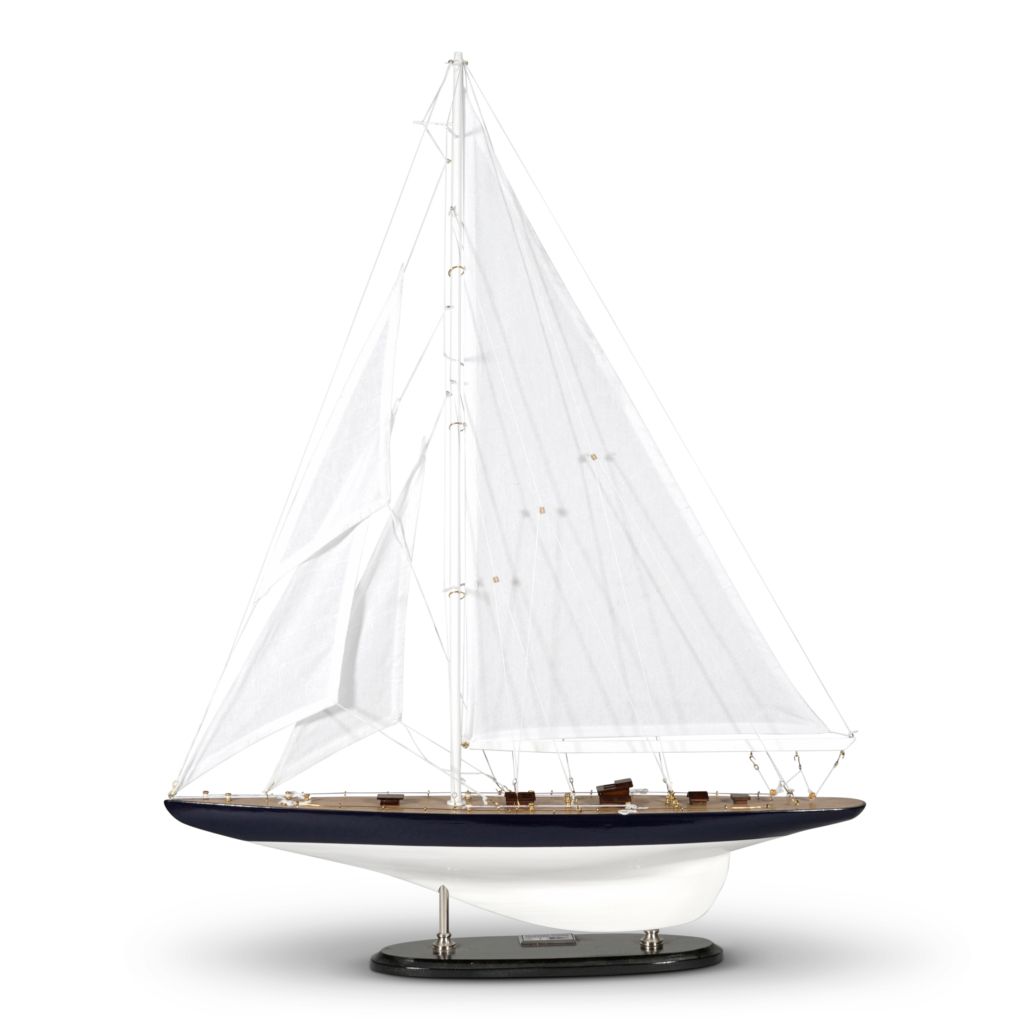 A model of the famous Rainbow yacht from the 1930's , with hand made deck planks, detailed rigging and hand tooled scale hardware throughout. 
This model is 65 cm long and 86.5 cm tall. 