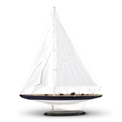 A model of the famous Rainbow yacht from the 1930's , with hand made deck planks, detailed rigging and hand tooled scale hardware throughout. 
This model is 65 cm long and 86.5 cm tall. 