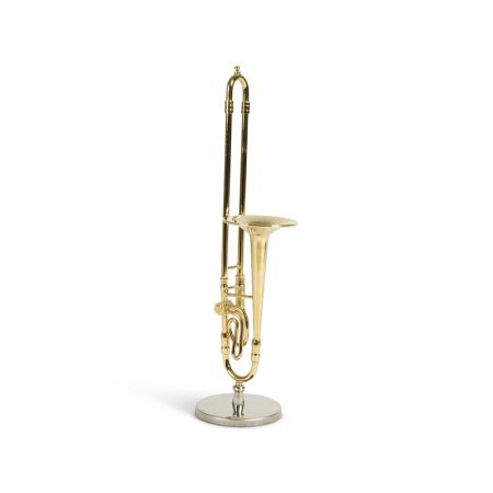 Shelf-size trombone on a stand in a gold finish.