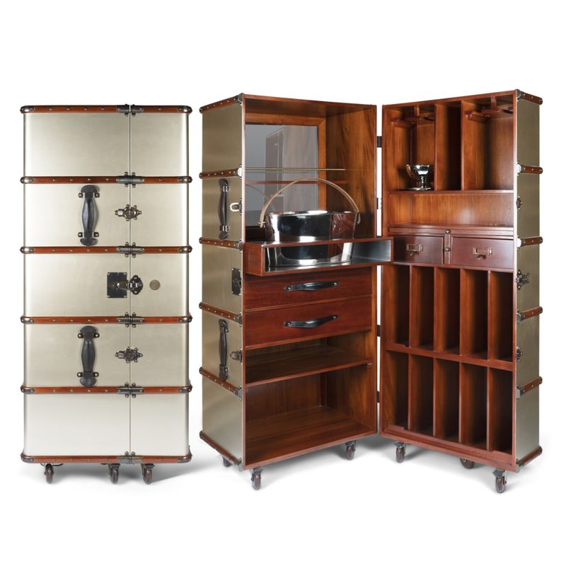 The height of luxury is the Stateroom Champagne Bar. Ideal in a reception room, dining room or bedroom for your most favoured guests. 
Closed up, it is a replica of an old fashioned trunk, but inside are just so many delights.