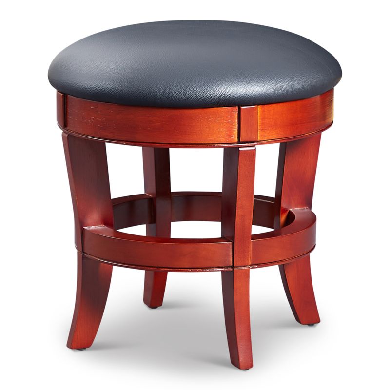 What a beauty- this upmarket low bar stool looks right at home round a low coffee table or bar table. Finished in honey stain, this Rubber Wood stool with a black seat pad is a work of art.