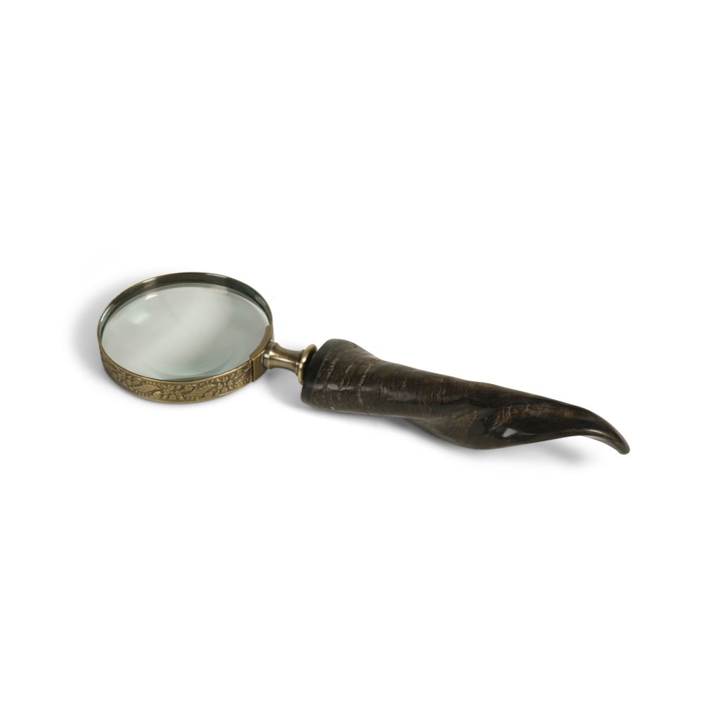 A rather special magnifier with a horn handle and a brass rimmed magnifying glass which is so useful for reading those hard to make out prints.