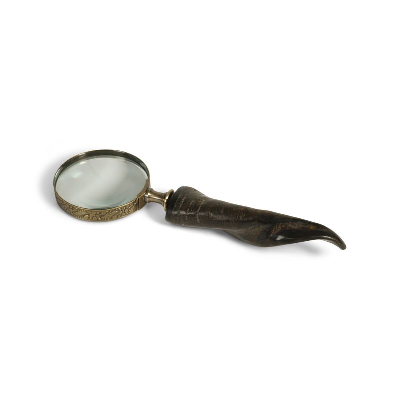 A rather special magnifier with a horn handle and a brass rimmed magnifying glass which is so useful for reading those hard to make out prints.