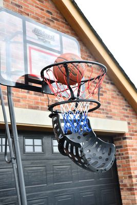 Midwest Basketball Shot Returner System
Black Hoops and Return
White and Red Net
Ball bring thrown through hoop