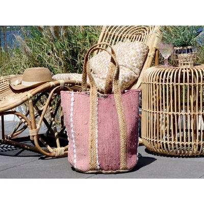 This fashionable Raspberry Bag will soon be your natural 'go-to' bag for its style and practical uses. It's a good size at a height of 60 cm, and it's made of recycled yarn too, so you are doing your bit for the planet.
Shown here in use on the patio, its warm raspberry tone sets it apart! 