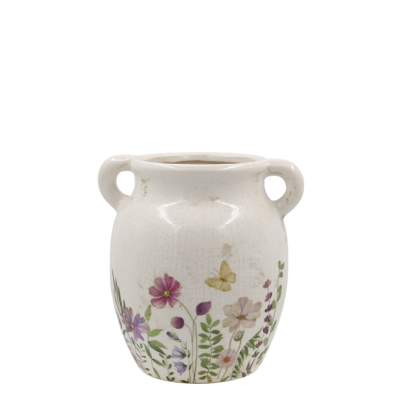 An absolutely beautiful range of chinaware with a wild flower design.This image is the pretty Medo vase which is available separately as well as part of the complete set. 
The set has a cream finish.