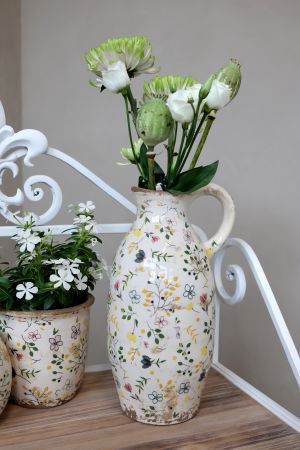 Beautiful handled jug with lovely delicate wildflower design. 
Height 27 cm
View shows jug in a room setting with jug displaying flowers