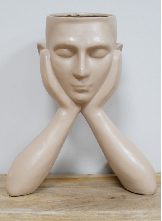 Close Up view of our Nigel!  He seems to be doing a lot of thinking with his head resting on his hands, but he is very useful with those plants at the top of his head!
Plants not included, just put your own choice in the head!
Suitable for artificial plants only.
Total height 35 cm