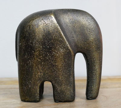 Image shows one elephant from side 
Contemporary style with long trunk touching ground.Two attractive elephant ornaments made from resin.
One large/ one small animals, separate from each other. Mother and baby
 sizes.
Height 19 cm and 14 cm 