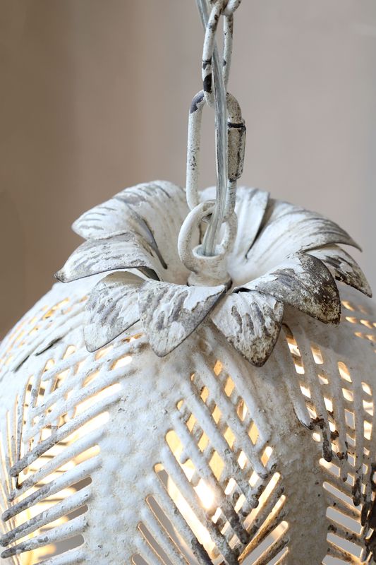This is the attractive Bodhi Light finished in Antique White to complement any room.
Image shows intricate design from top
Made in iron and measures 24.5 cm