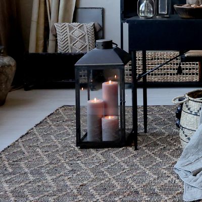 Natural, Black and Cream Rectangular Jute Diamond Pattern.
Lifestyle image dressed with lantern and candles
