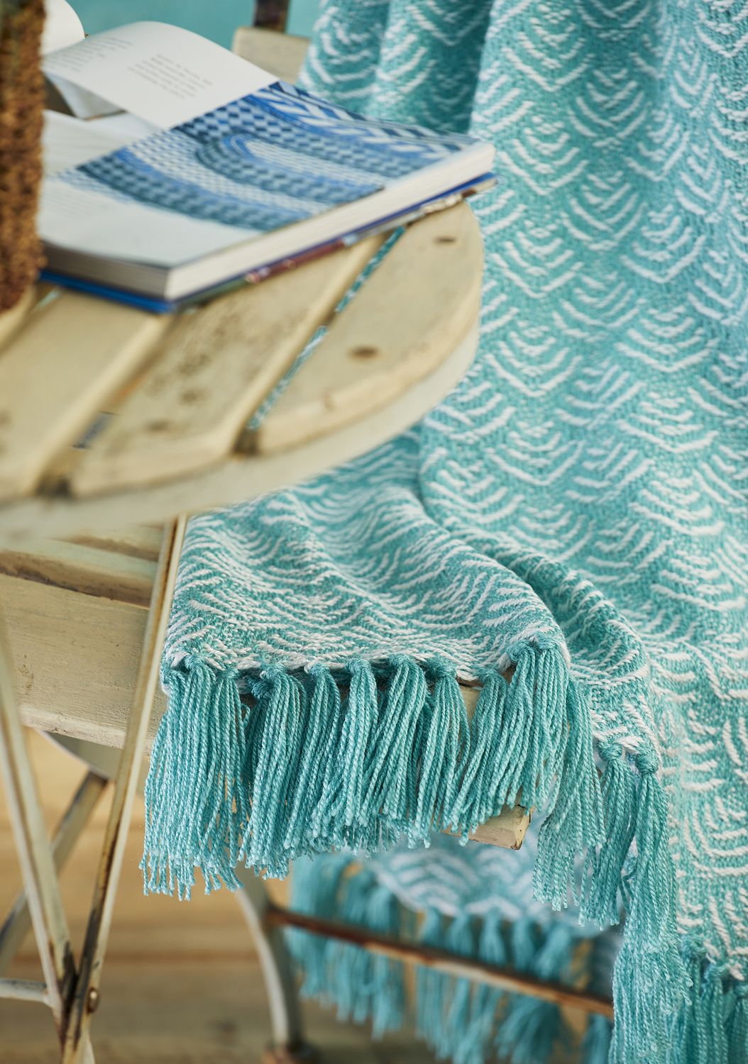 This pretty throw is amazingly 100% recycled plastic bottles - you'd never believe it- it's so soft, washable and dries quickly. Amazing!