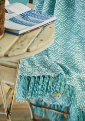 This pretty throw is amazingly 100% recycled plastic bottles - you'd never believe it- it's so soft, washable and dries quickly. Amazing!