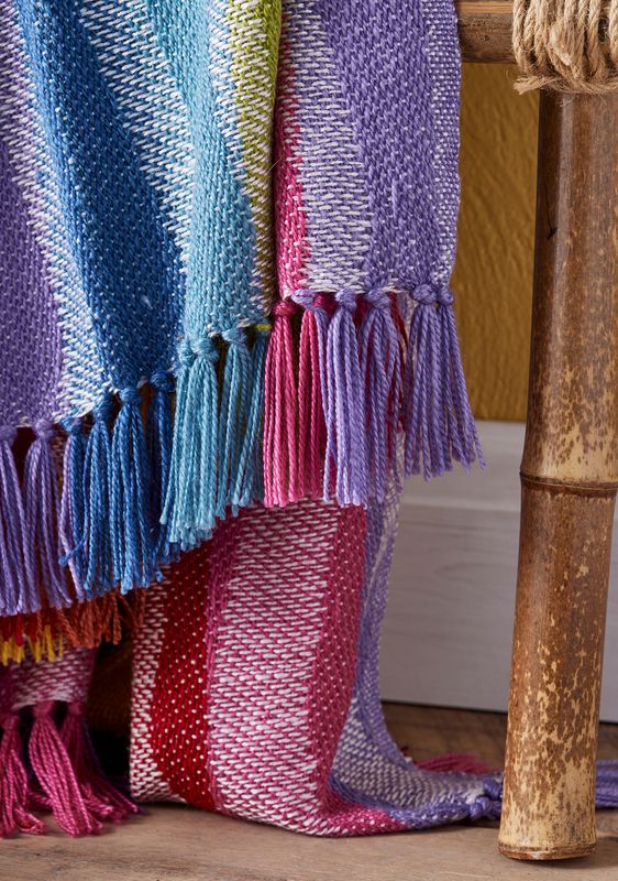 I Used to be a Bottle - Rainbow Zigzag Throw Pretty rainbow finished throw/blanket which is 100% recycled material making a fine soft throw for indoor or outdoor use.