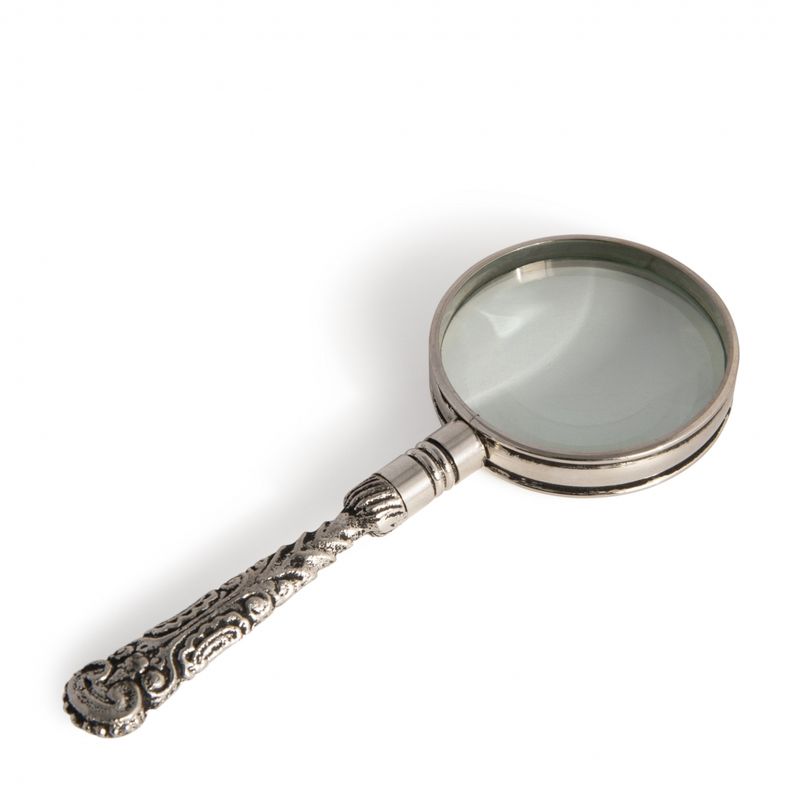 Pride comes first in the ownership of this fine Rococo magnifying glass in a silver finish.