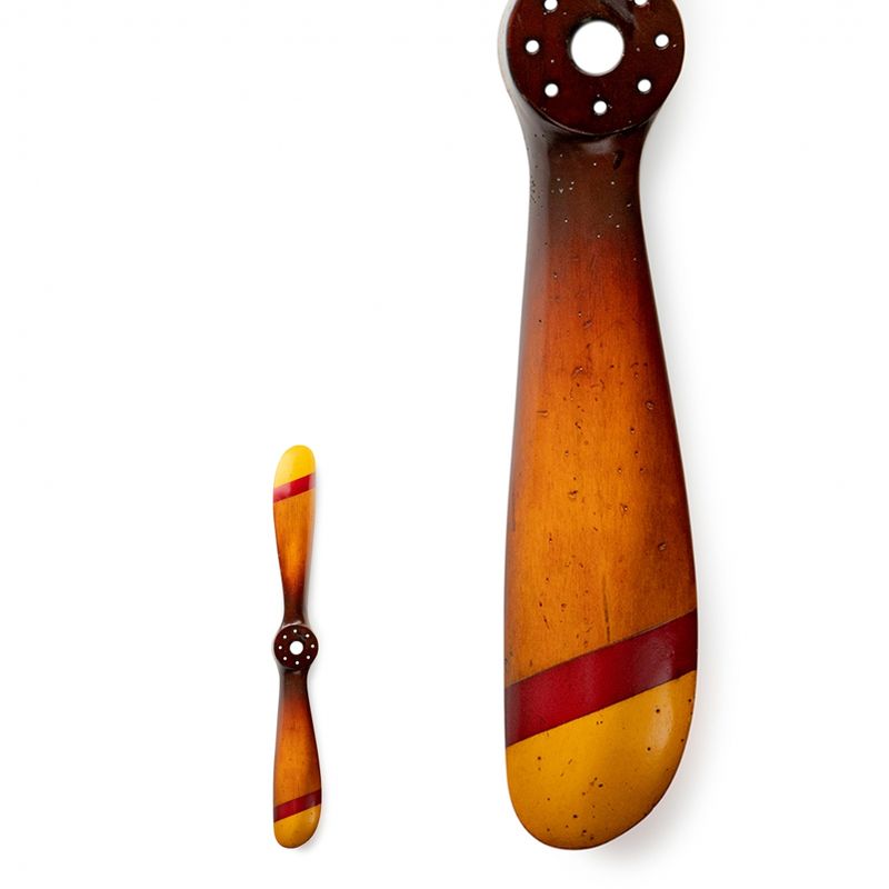 What a beautifully engineered wooden propeller that would make a fine item of wall art work, and particularly for anybody with a liking or connection with aircraft. Lovely red and gold stripes on the ends. 