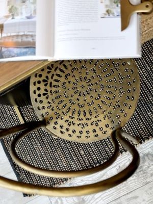 Antique Brass Finish Metal Dining Chair. With double loop back and decorative cut out patterned seat.
seat base pattern