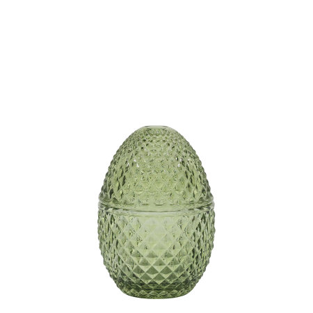 Small decorative green glass container with a diamond-cut texture and a rounded lid, shaped like an egg