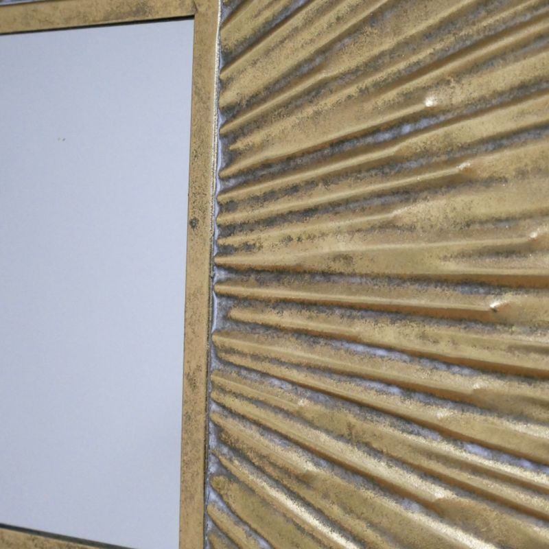 Decorative square wall mirror with a metallic gold frame featuring raised, radiating ridges forming a sunburst pattern