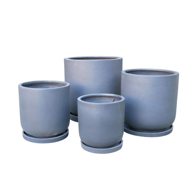The Calder Garden Planters with Saucers - Set of Four A set of four planters for your patio.