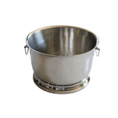 A plain aluminium ice bucket for a class dinner party.