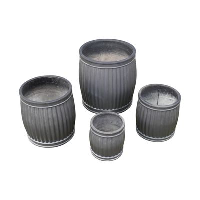 The Looe Garden Planters - Set of Four A set of four Feldspar Clay barrel-shaped planters