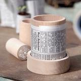 Go green from the start! Make your own plant pots from old newspapers with this clever item and save money too!