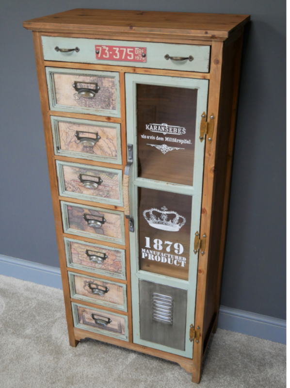 This is the front close-up image of our 1879 Storage Cabinet, showing the array of drawers and compartments that make this unit so useful. You can also get a view of the attractive signage on the cupboard doors.  
It is made from fine fir wood and stands an impressive 127 cm, with a 59 cm width. 