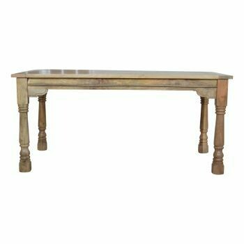 Solid wood dining table with turned legs and extension leaves
