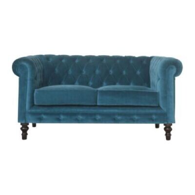 Teal Velvet Two Seater Chesterfield Sofa Teal is a serene addition to our Chesterfield colourways that reflects modern taste and looks first class in any situation.