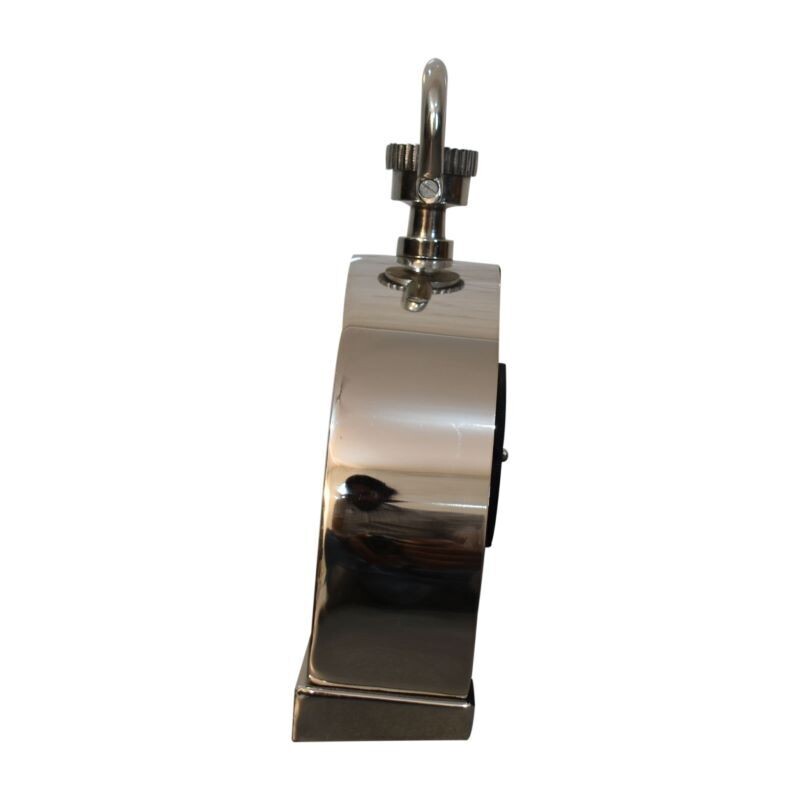 Featuring a contemporary design with a black face and a chrome finish, this stylish semi-circle with large roman numerals that are easy to read. Display this piece beautifully on your bedside.