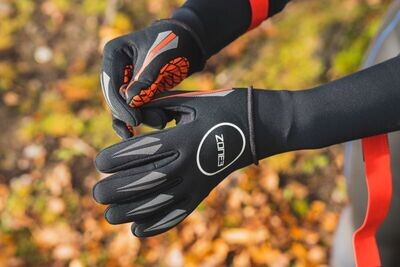 Zone3 Neoprene Swim Gloves
Black with Orange trim and white logos
Set outside