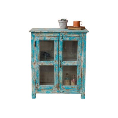 A vintage style two drawer cabinet with a turquoise distressed finish.
At just three feet high, there are many places around the home that this will look great.