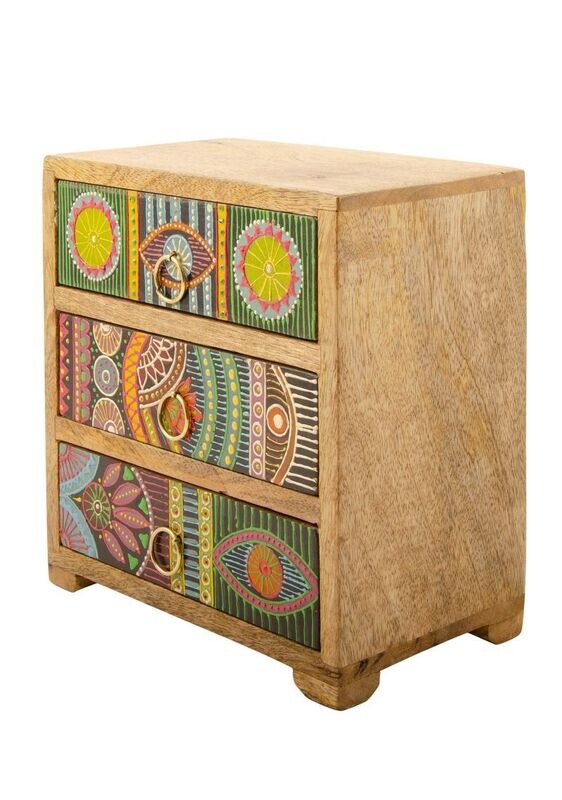 Mango wood contrasts very nicely with the African style drawer fronts