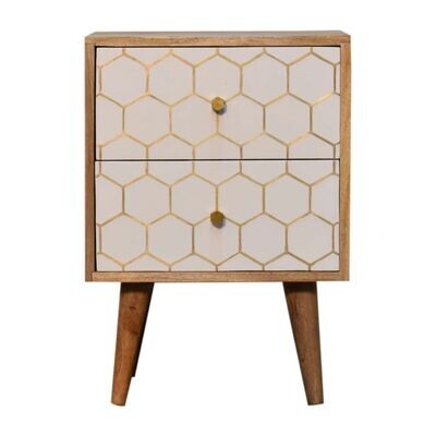 Amelia bedside cabinet in natural wood tones with white painted frame and carved geometric pattern on the door