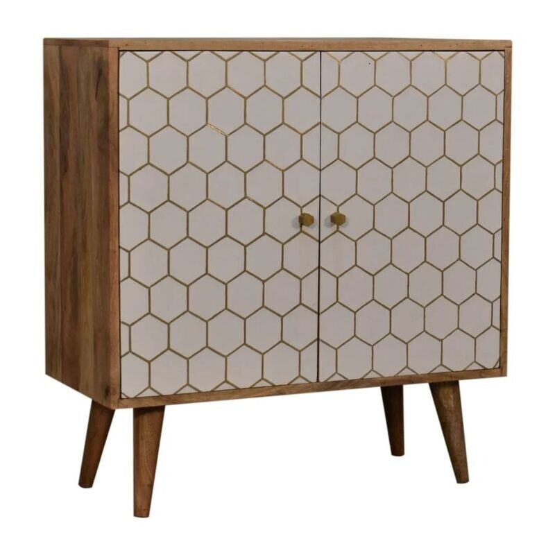 Wooden two-door cabinet with a white hexagonal patterned front, brass knobs, and tapered wooden legs.